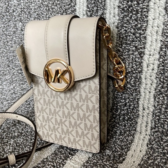 Michael Kors Carmen Small Logo Smartphone Crossbody Bag
Light Cream Multi - Picture 15 of 16
